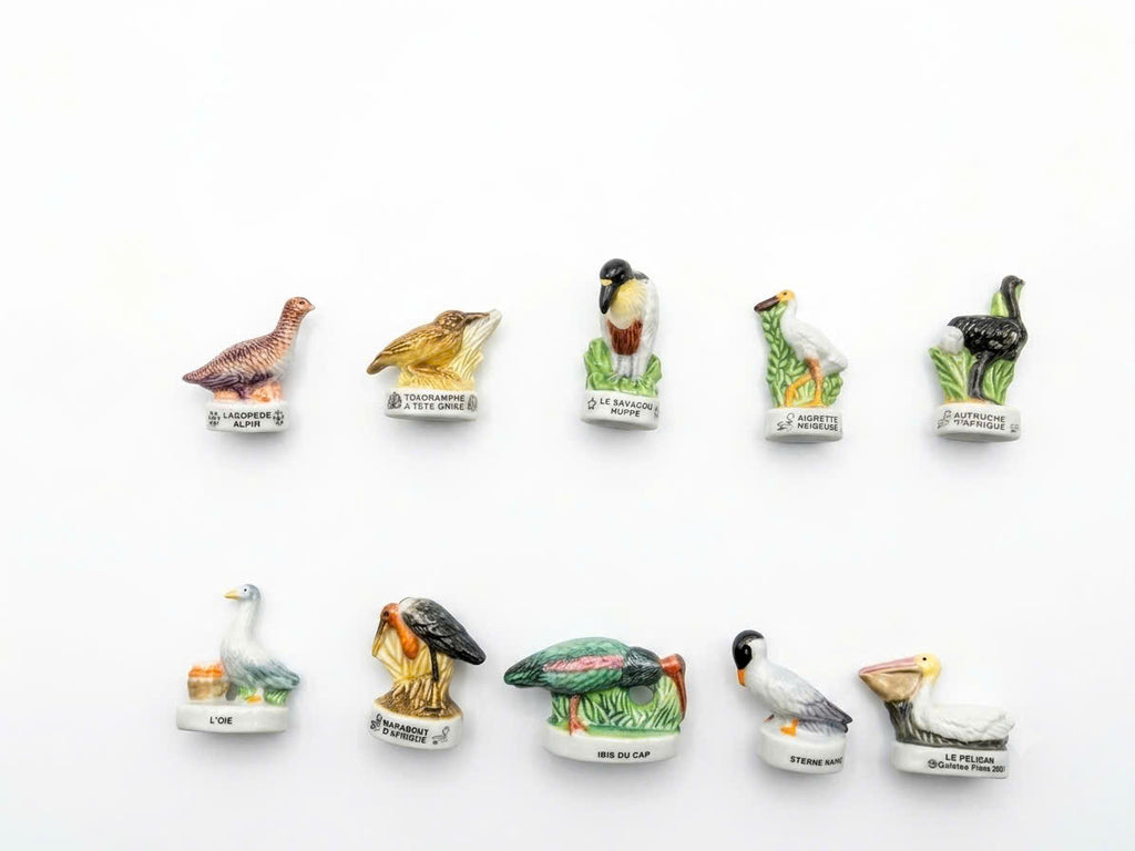 Exotic birds porcelain fève collection – 10 hand-painted miniature bird figurines including Pelican, African Ostrich, Snowy Egret and Marabou Stork