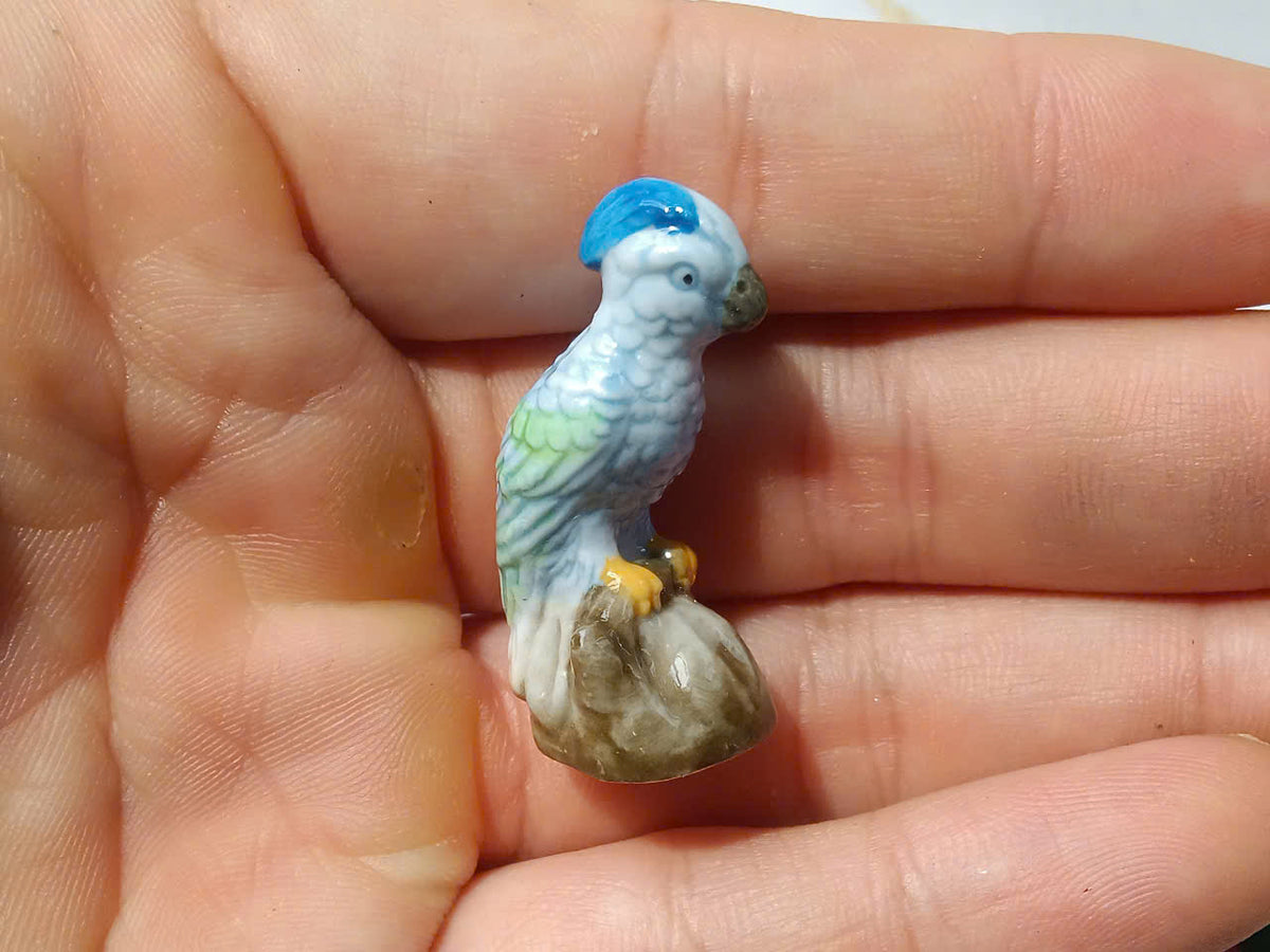 French Parrot Fève Set – Hand-Painted Porcelain Miniatures (5 Pieces)