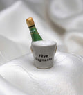 Fève Gagnante miniature green bottle in ceramic ice bucket